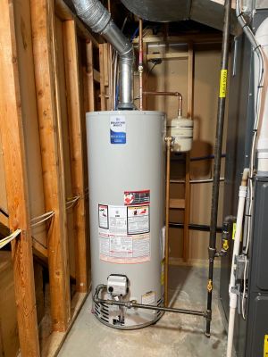 Repair of a tanked water heater in a home's basement