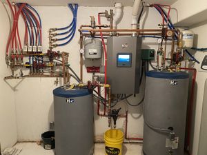 Repair on a 10 year old boiler with storage tanks in a residential home used for radiant flooring and domestic hot water